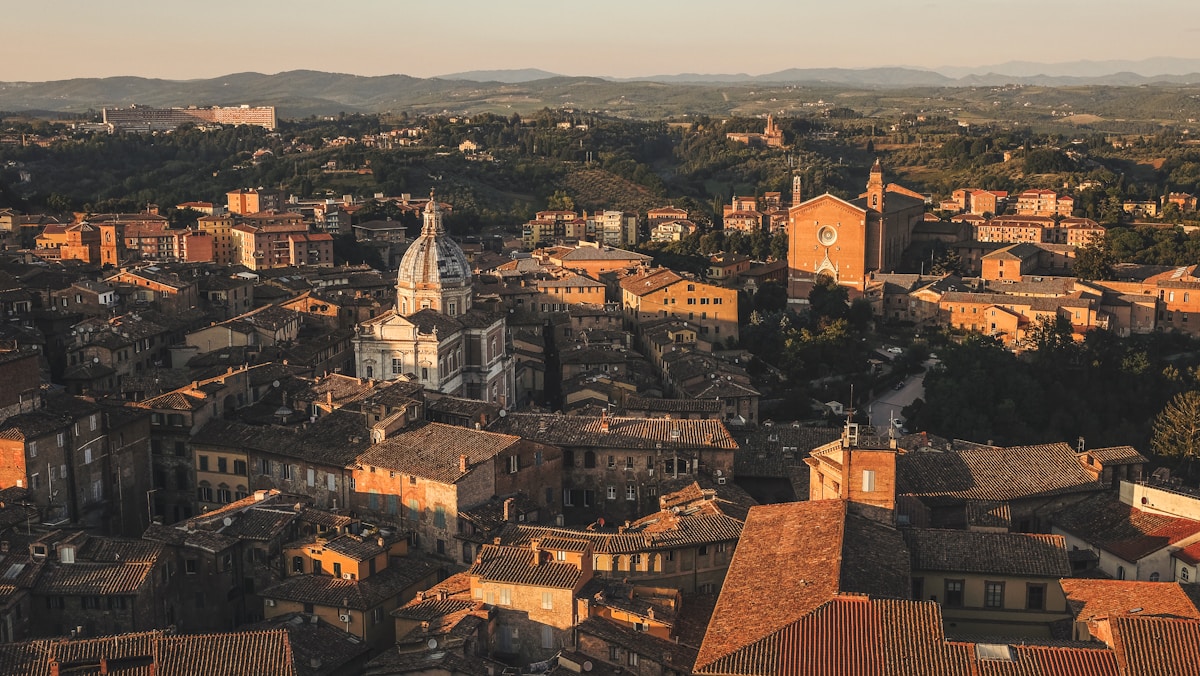 Aerial drone view of Siena old town charming buildings, Tuscany, Italy