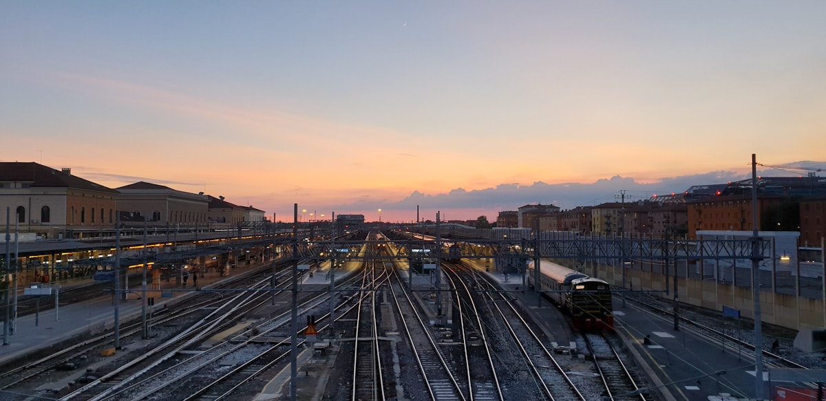 Railway tracks at sunset at Bologna Centrale station, Emilia-Romagna, Italy