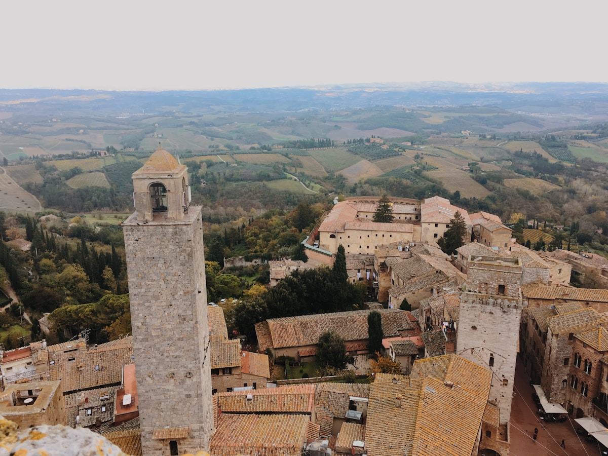 Medieval towers and terracotta rooftops of a Tuscan hilltop town, Tuscany
