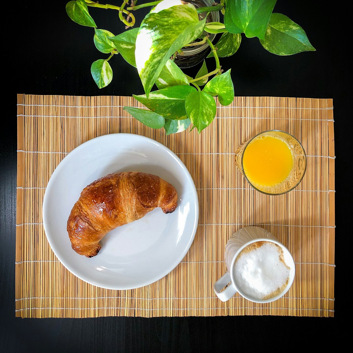 Croissant with coffee and orange juice, Italian breakfast, Genoa, Liguria, Italy