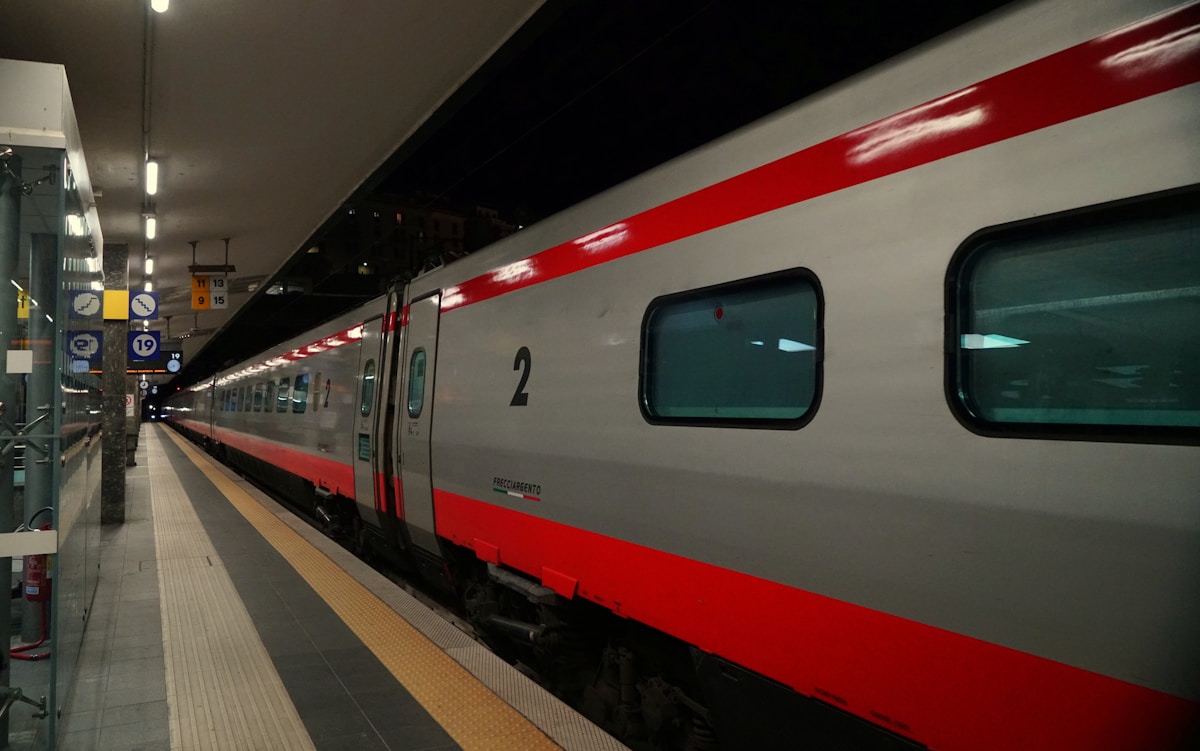 Frecciargento high-speed train at a modern Italian railway station