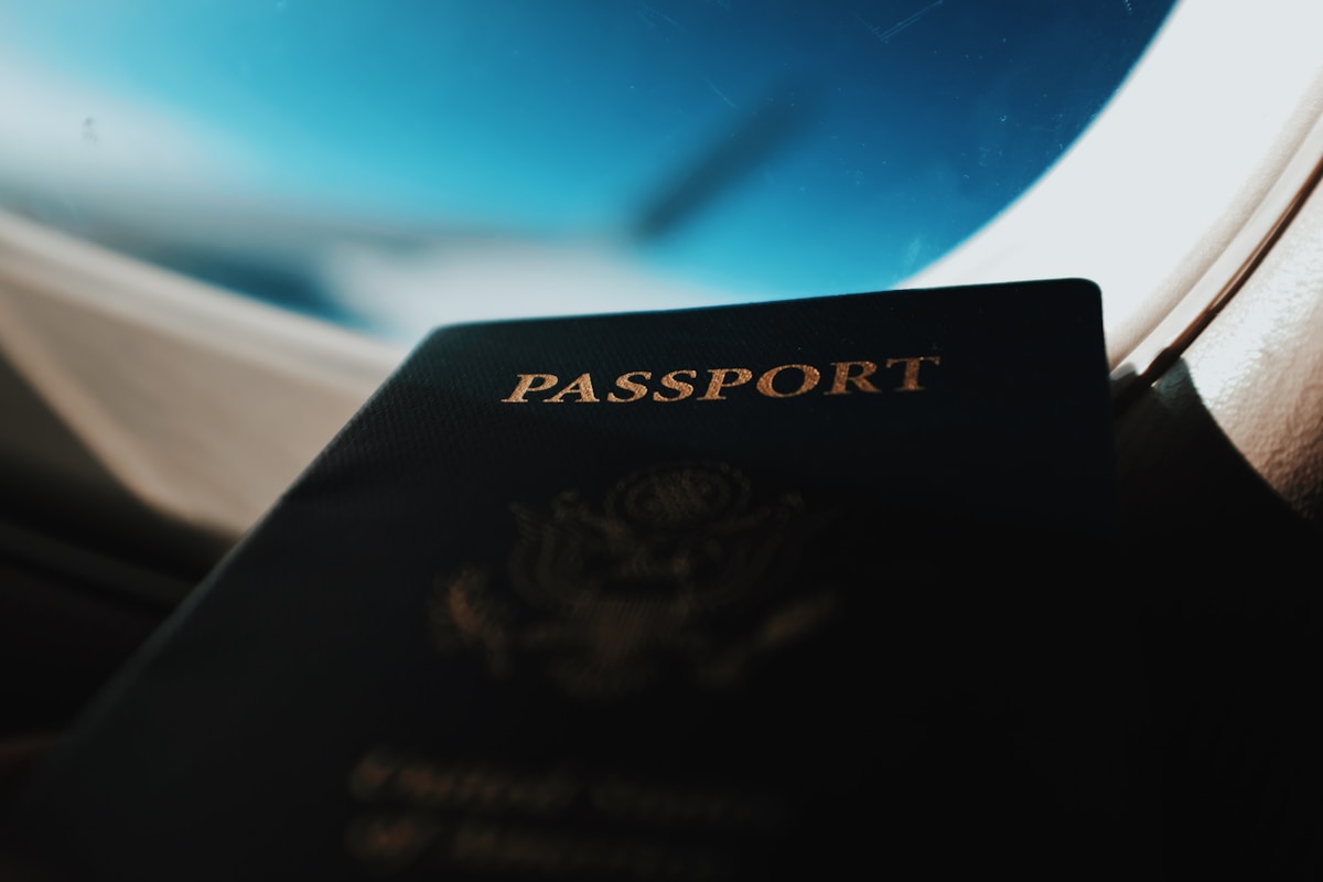 Passport booklet on a desk, Italy digital nomad visa requirements