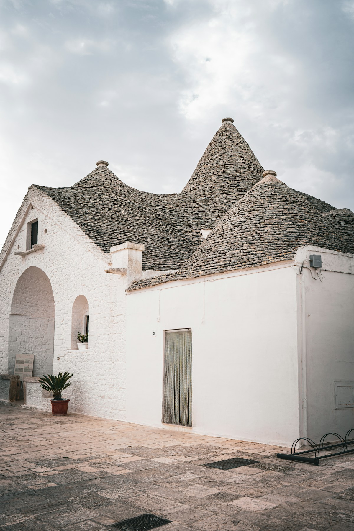 Trulli houses with conical stone roofs in Alberobello, Puglia, Italy