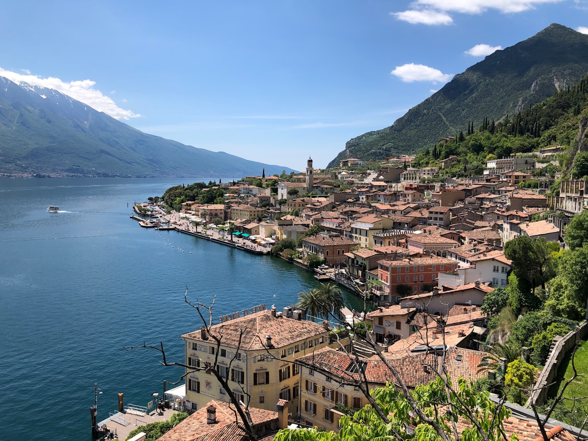 Village on the shore of Lake Garda with mountains behind, Limone sul Garda, Italy