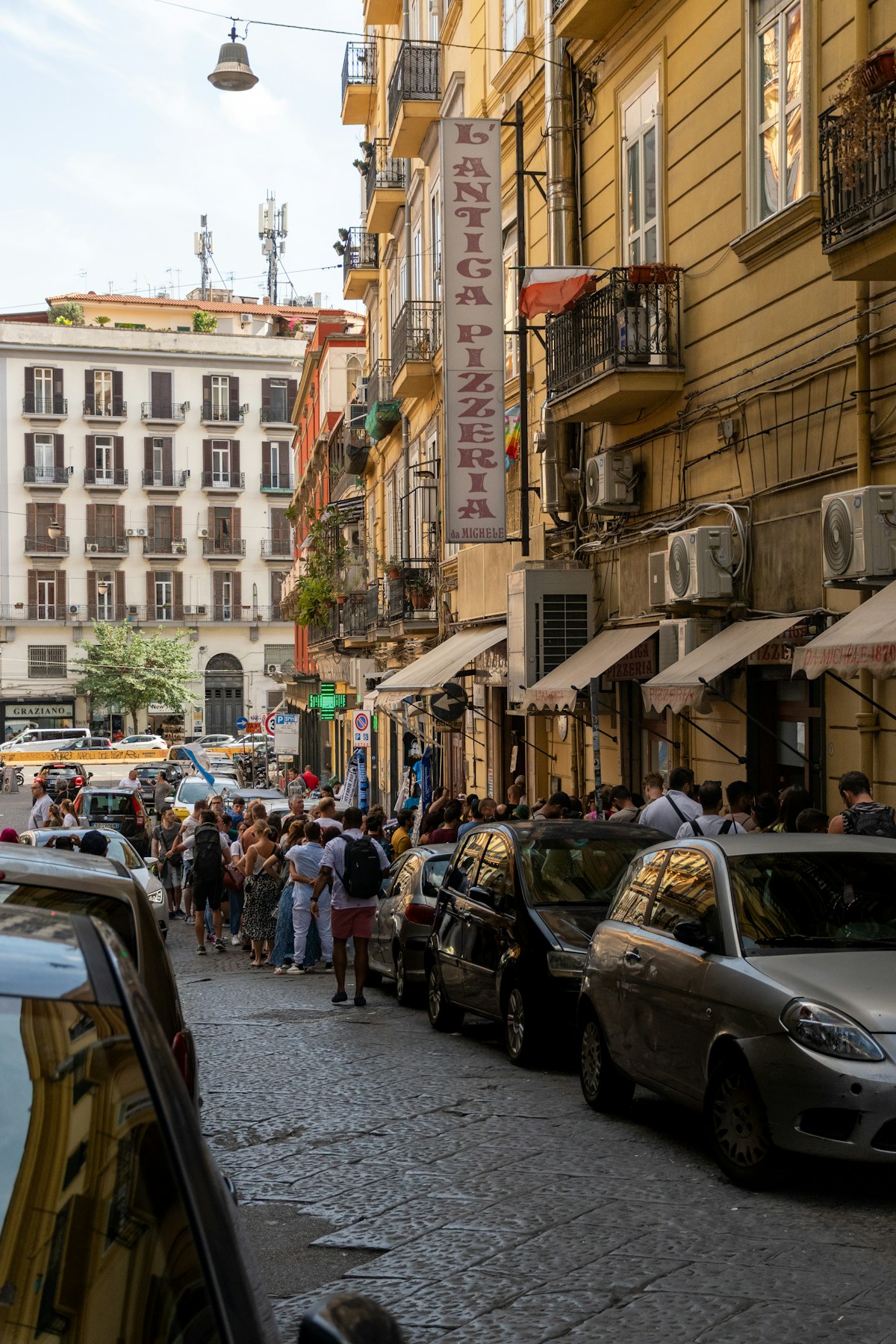 Busy street with cars and people, Naples area, Italy