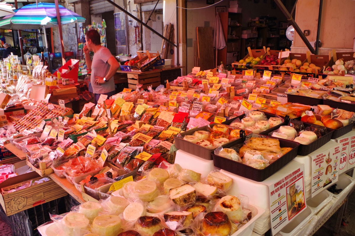 Palermo market stall with abundant Sicilian food and produce, Sicily, Italy