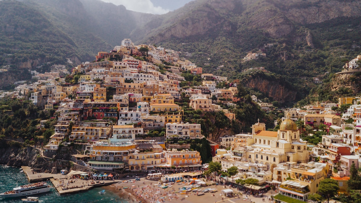Aerial view of Positano's colourful hillside buildings above the Tyrrhenian Sea, Amalfi Coast, Italy