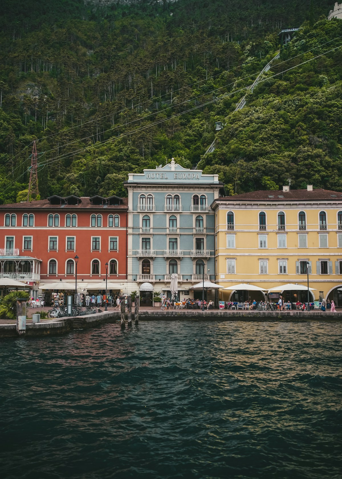 Colourful buildings line the lakefront at Riva del Garda, Trentino, Italy