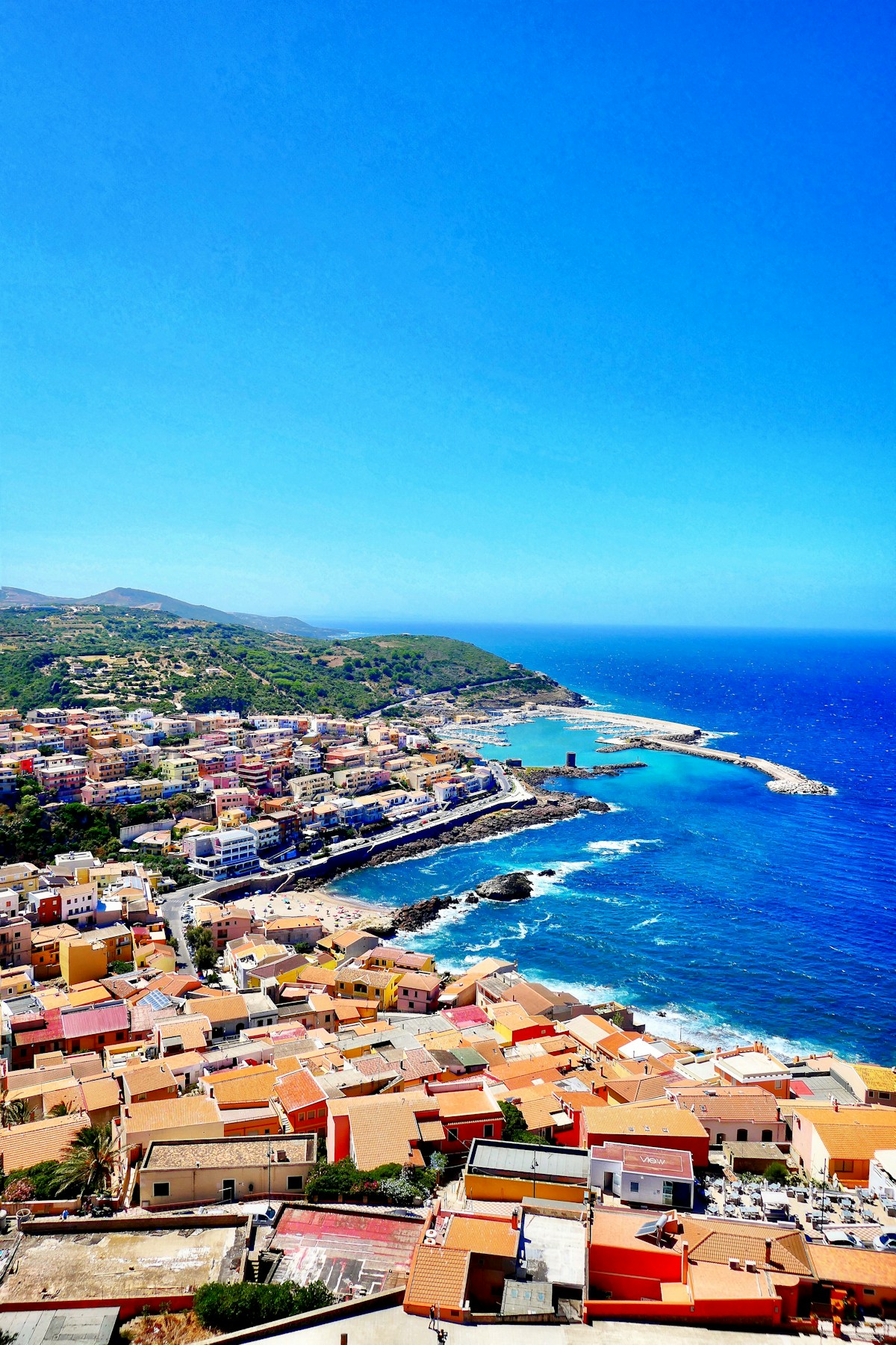Aerial view of coastal city near sea, Castelsardo, Sardinia, Italy