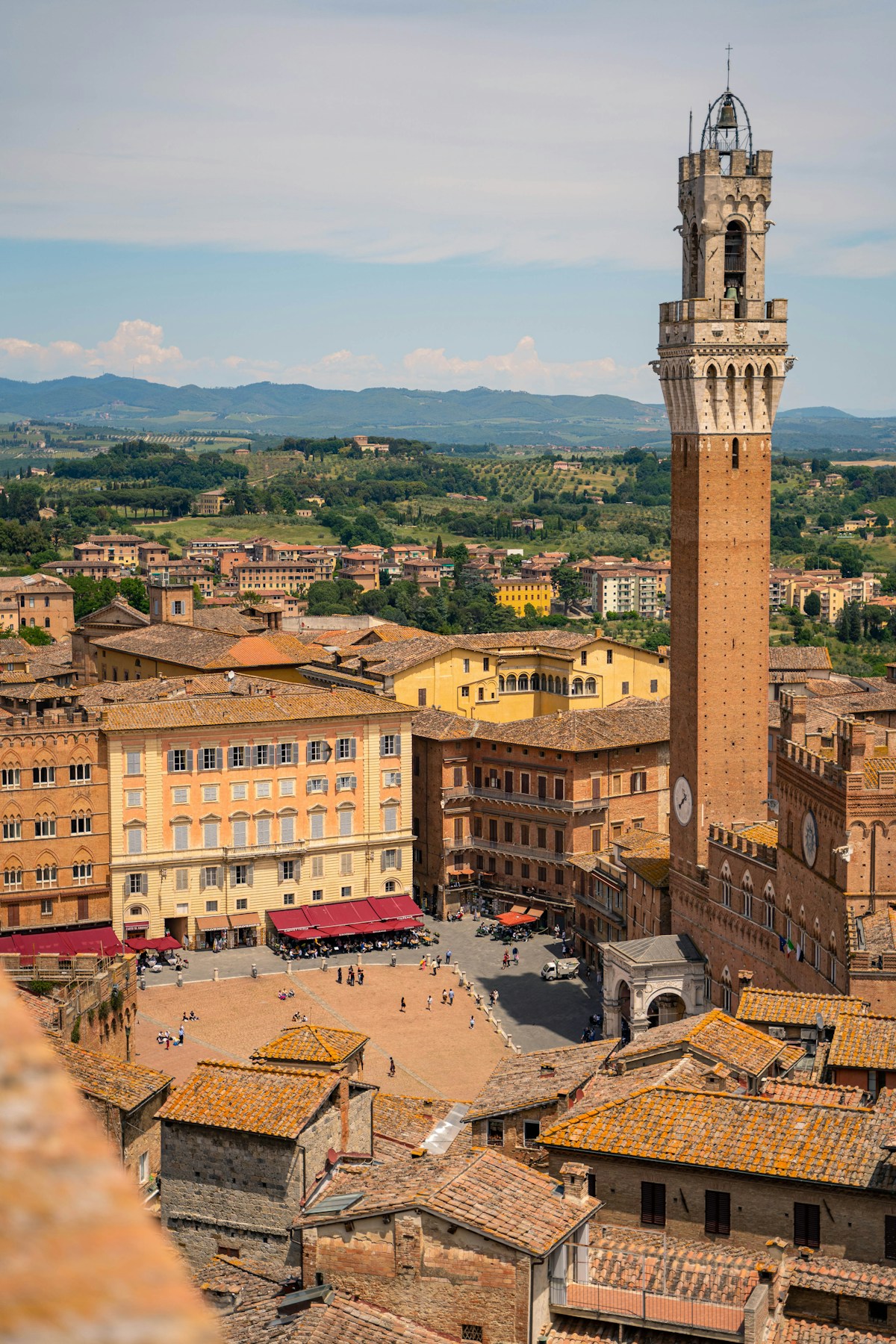 Tower of Torre del Mangia against blue sky, Siena, Tuscany, Italy