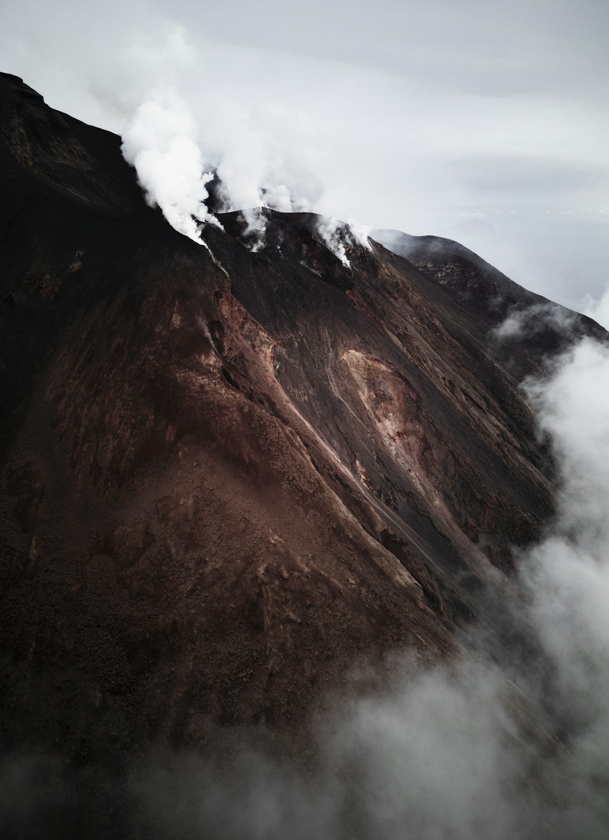 Steam and gas venting from Stromboli volcano summit in the Aeolian Islands, Sicily, Italy