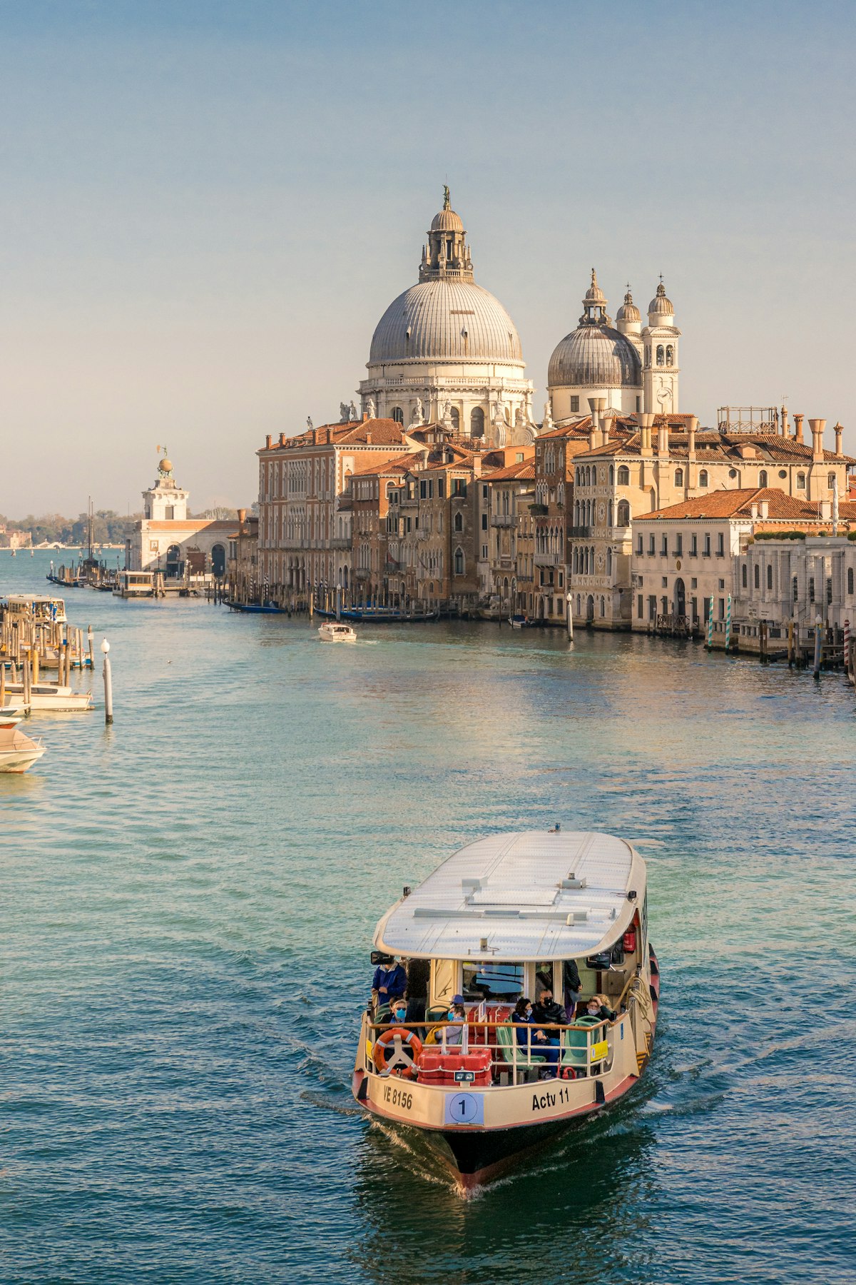 ACTV vaporetto boat on the Grand Canal with Santa Maria della Salute, Venice