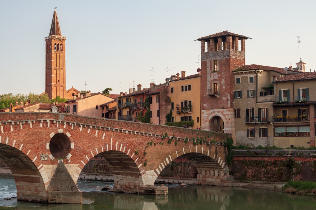 Ponte Pietra bridge over the Adige River in Verona at golden hour